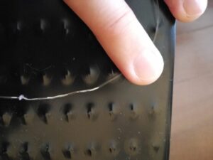 つぶれたように見えるプロアルテカーボンの1弦